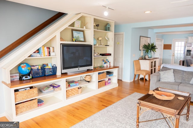 living room with hardwood / wood-style flooring