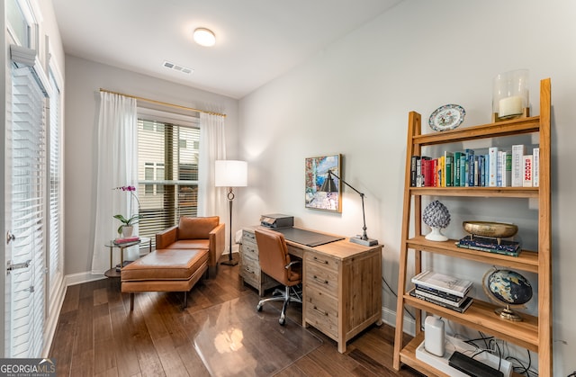 office area with dark hardwood / wood-style flooring