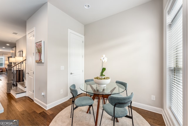 dining room featuring dark hardwood / wood-style flooring