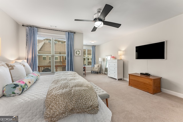 bedroom with ceiling fan and carpet flooring