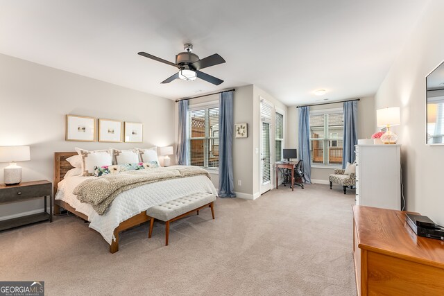 carpeted bedroom featuring ceiling fan