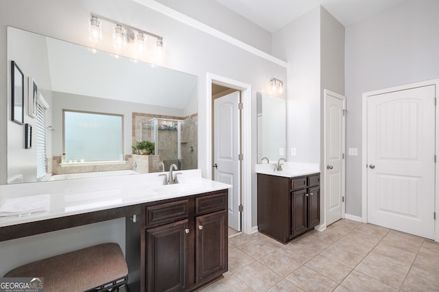 bathroom featuring vanity, tile patterned flooring, and an enclosed shower