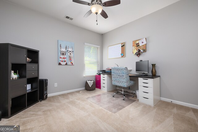 office area with light carpet and ceiling fan