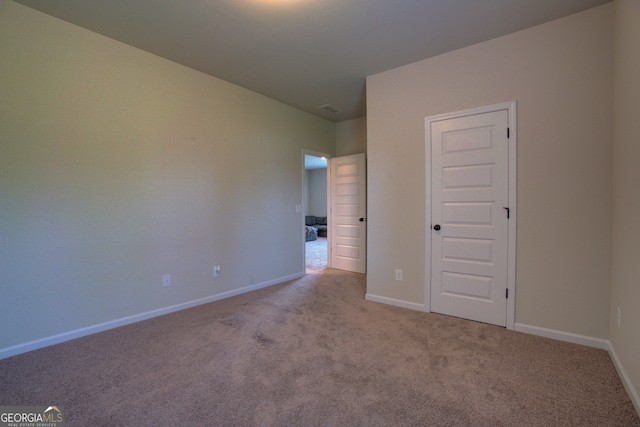 view of carpeted spare room