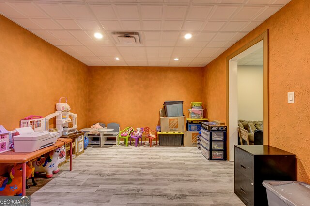 playroom featuring hardwood / wood-style floors