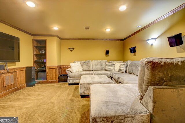 carpeted living room featuring built in features and ornamental molding