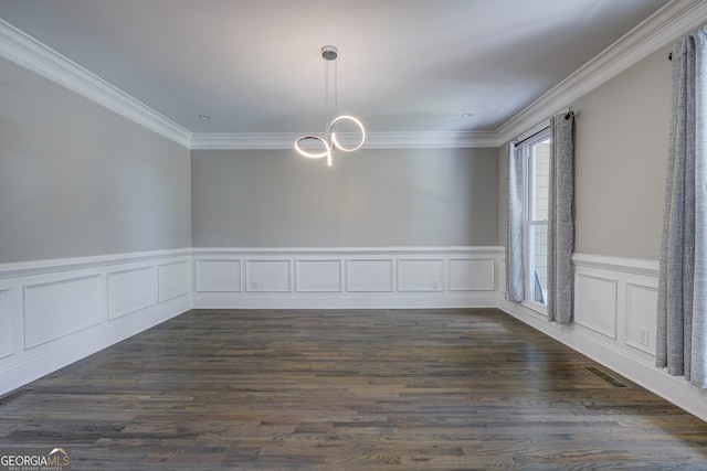 unfurnished dining area with an inviting chandelier, dark hardwood / wood-style flooring, and ornamental molding