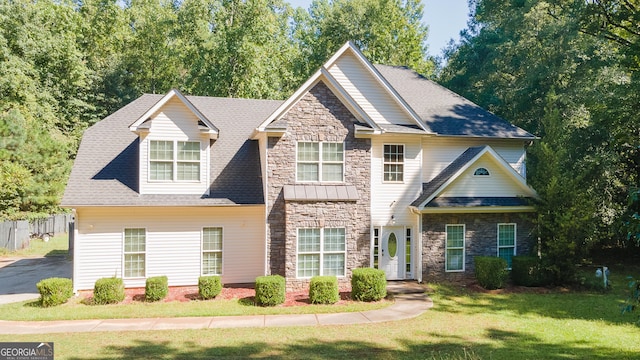 view of front of property with a front lawn