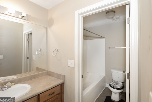 full bathroom featuring tile patterned flooring, toilet, vanity, washtub / shower combination, and a textured ceiling