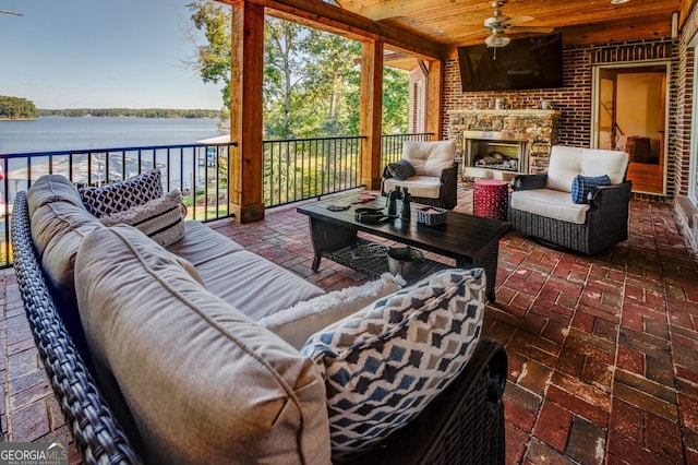 view of patio featuring an outdoor living space and ceiling fan