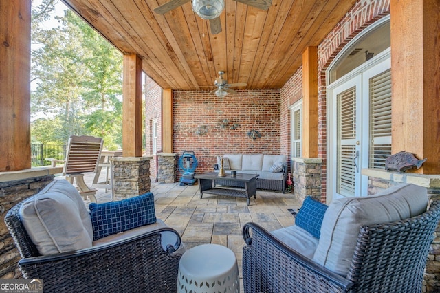 view of patio featuring ceiling fan and outdoor lounge area