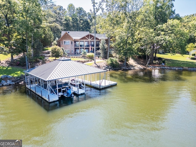 view of dock featuring a water view and a lawn