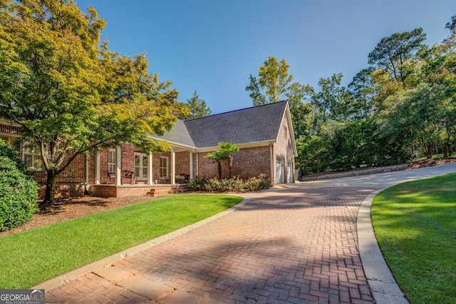 view of front of home with a front yard