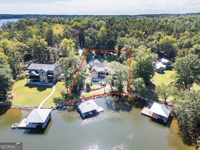 birds eye view of property featuring a water view