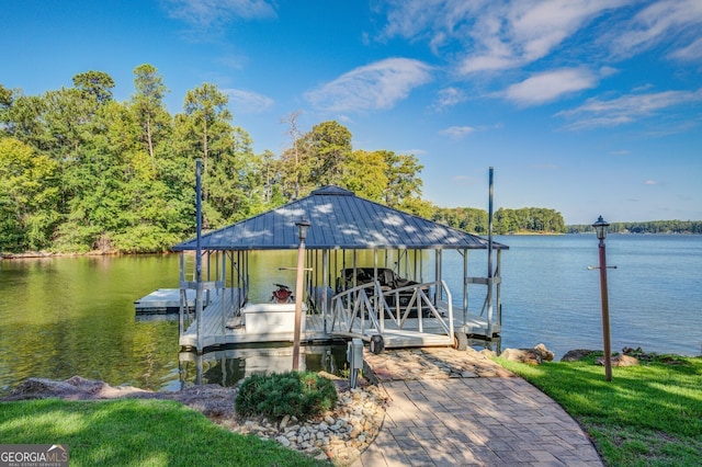 dock area with a water view