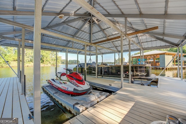 view of dock with a water view