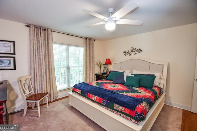 bedroom featuring ceiling fan and carpet floors