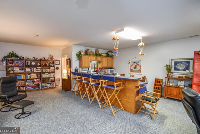 view of carpeted dining space