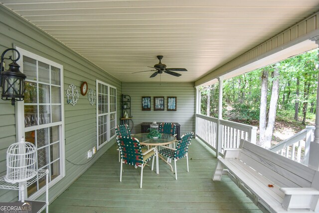 wooden deck with ceiling fan