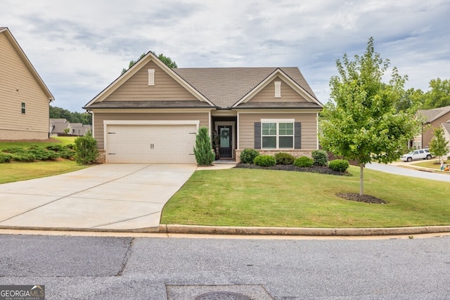 view of front facade featuring a front lawn and a garage