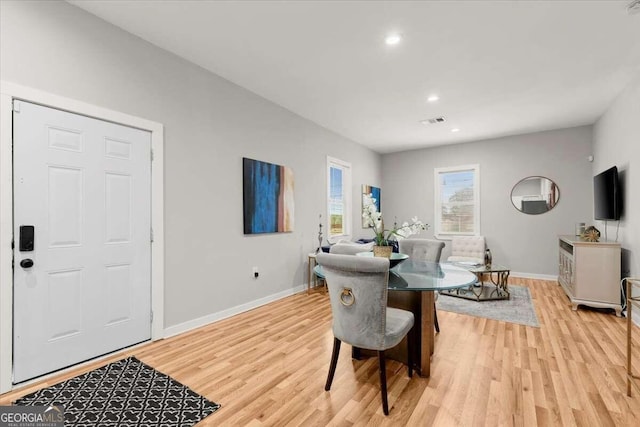 dining room featuring light hardwood / wood-style flooring