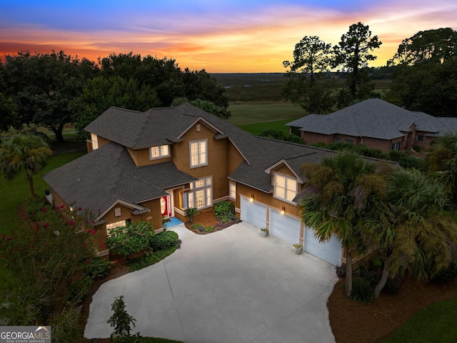 view of front of property with a garage