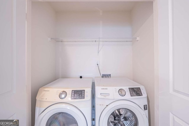 laundry area featuring independent washer and dryer