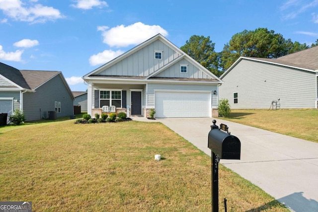 craftsman-style house featuring a front lawn and a garage