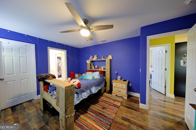 bedroom featuring ceiling fan and dark hardwood / wood-style flooring