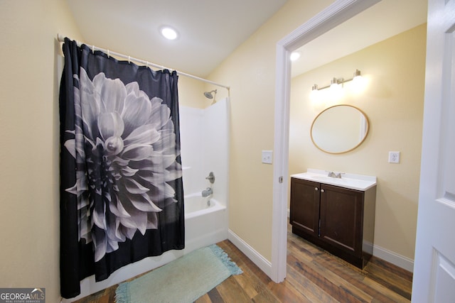 bathroom featuring vanity, shower / tub combo with curtain, and wood-type flooring