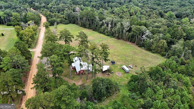 birds eye view of property featuring a rural view