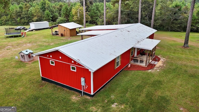 view of outdoor structure with a yard