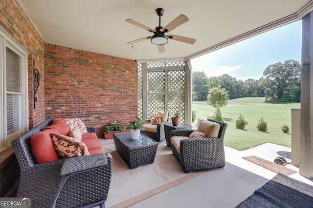 view of patio / terrace with ceiling fan and outdoor lounge area