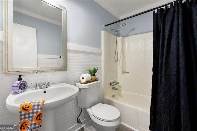 bedroom featuring visible vents, light wood-style floors, a textured ceiling, washer / dryer, and baseboards