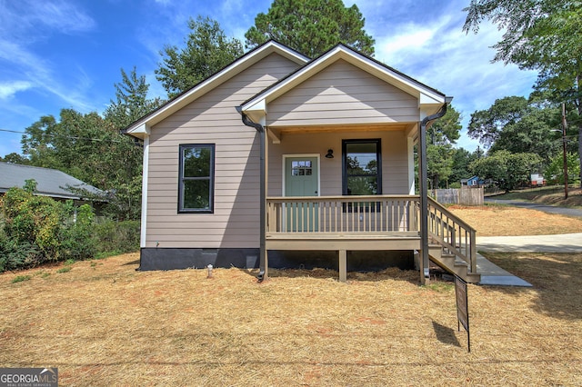 bungalow-style home featuring a porch