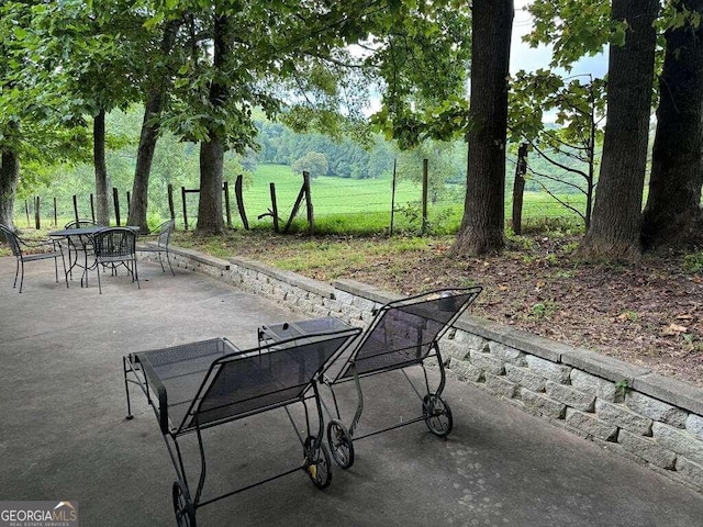 view of community with a patio area