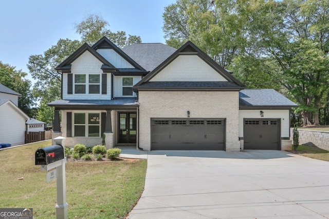 craftsman inspired home featuring a front yard