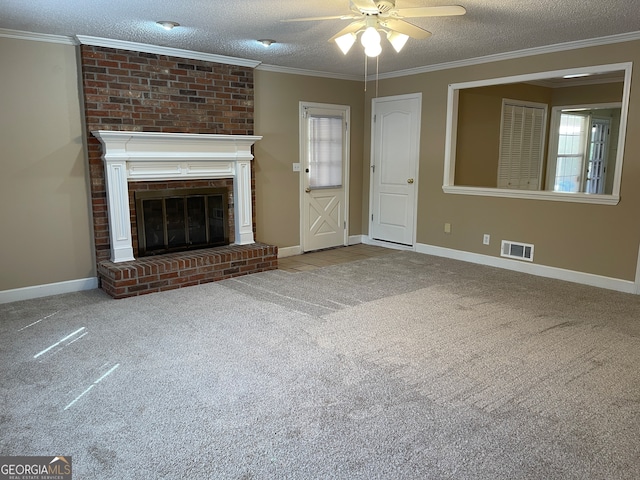 unfurnished living room with carpet flooring, a healthy amount of sunlight, ceiling fan, and a textured ceiling