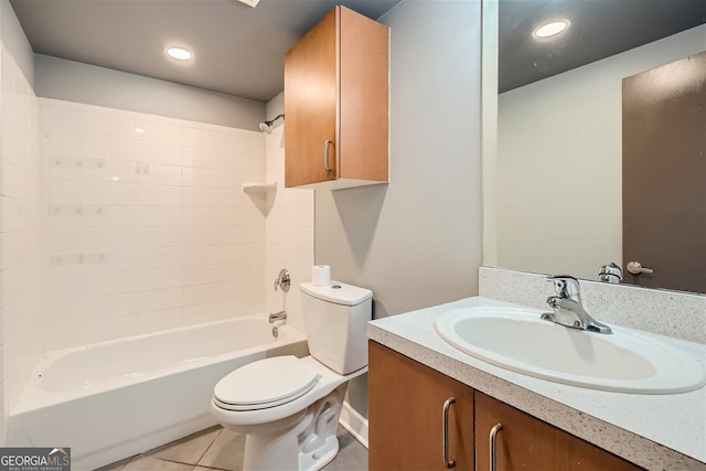 full bathroom featuring shower / bathing tub combination, vanity, toilet, and tile patterned flooring