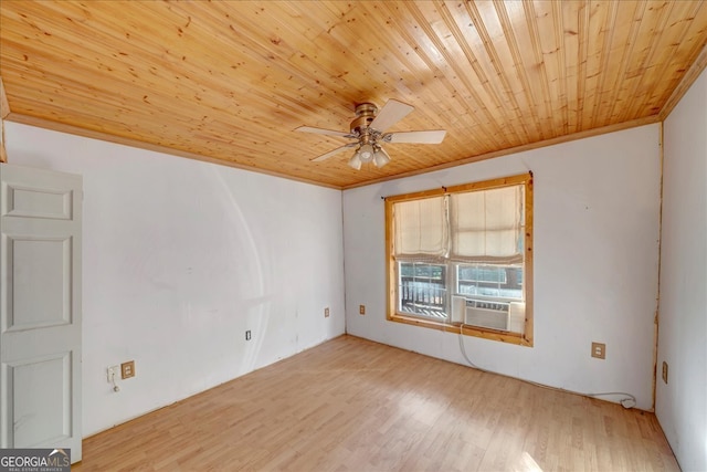 unfurnished room featuring cooling unit, crown molding, ceiling fan, light wood-type flooring, and wood ceiling