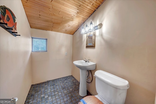 bathroom featuring sink, vaulted ceiling, toilet, and wood ceiling