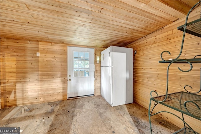 interior space featuring wood walls and wood ceiling