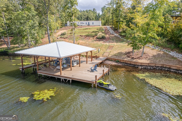 dock area with a water view