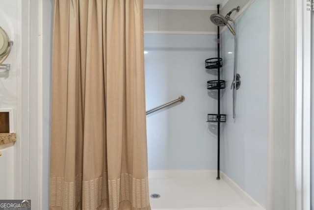 bathroom with curtained shower