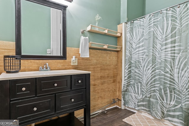 bathroom featuring vanity and wood-type flooring