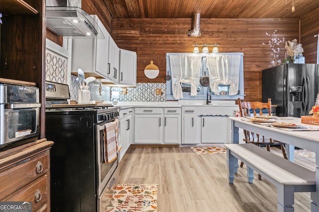 kitchen with wood ceiling, extractor fan, white cabinets, black fridge with ice dispenser, and stainless steel range with gas cooktop