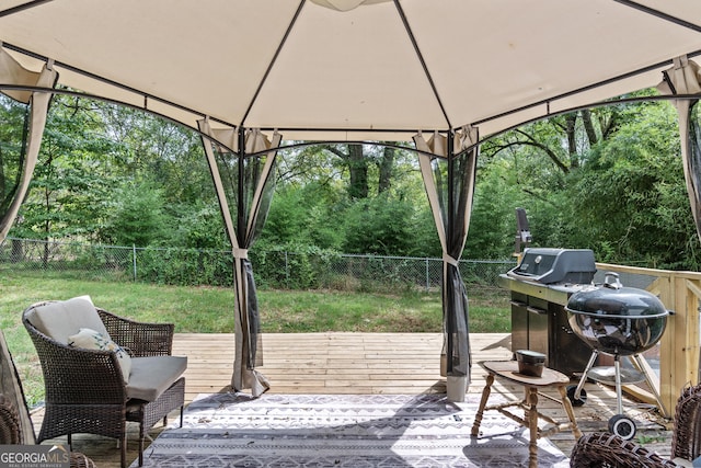 view of patio / terrace with a gazebo and a wooden deck