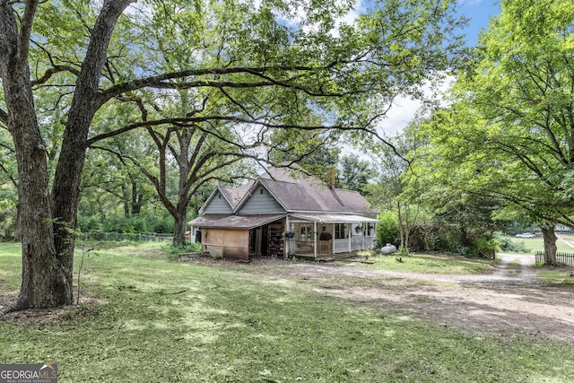 exterior space featuring an outbuilding