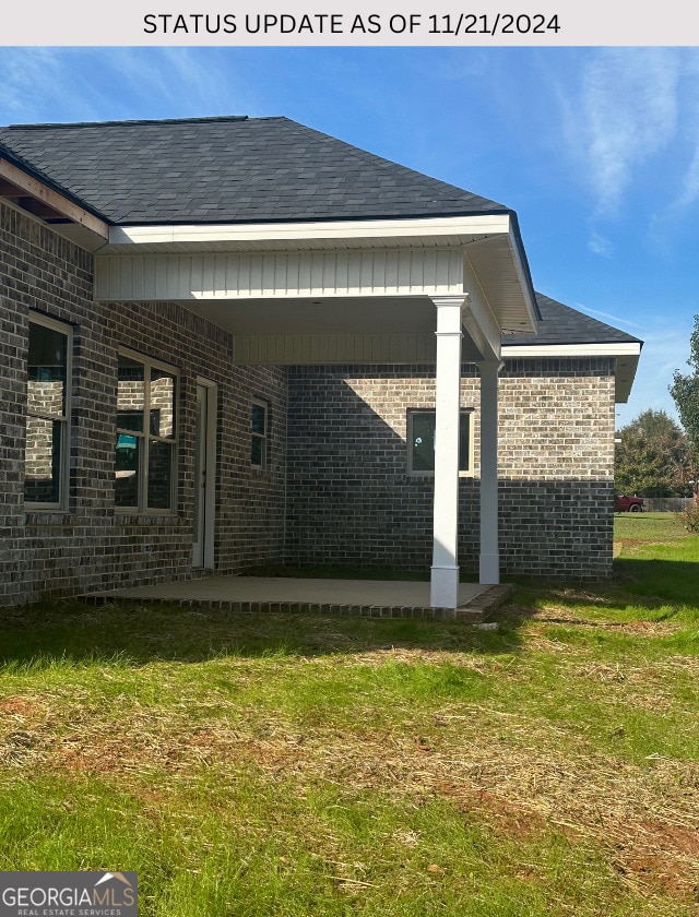 view of property exterior featuring a yard