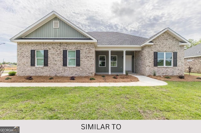 view of front of home with a front lawn